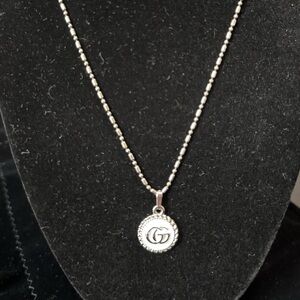 Gucci pendant on Sterling Silver Chain